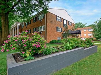 Well-manicured grounds with colorful seasonal plantings